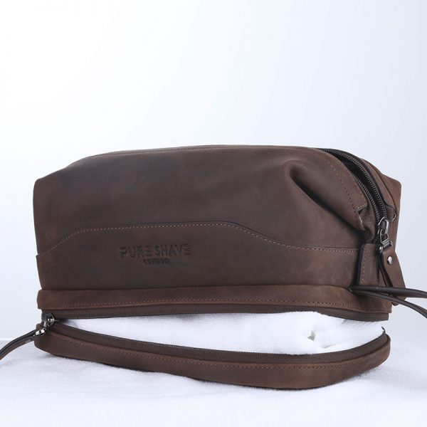 Pure Shave leather wash bag with towel in lower compartment